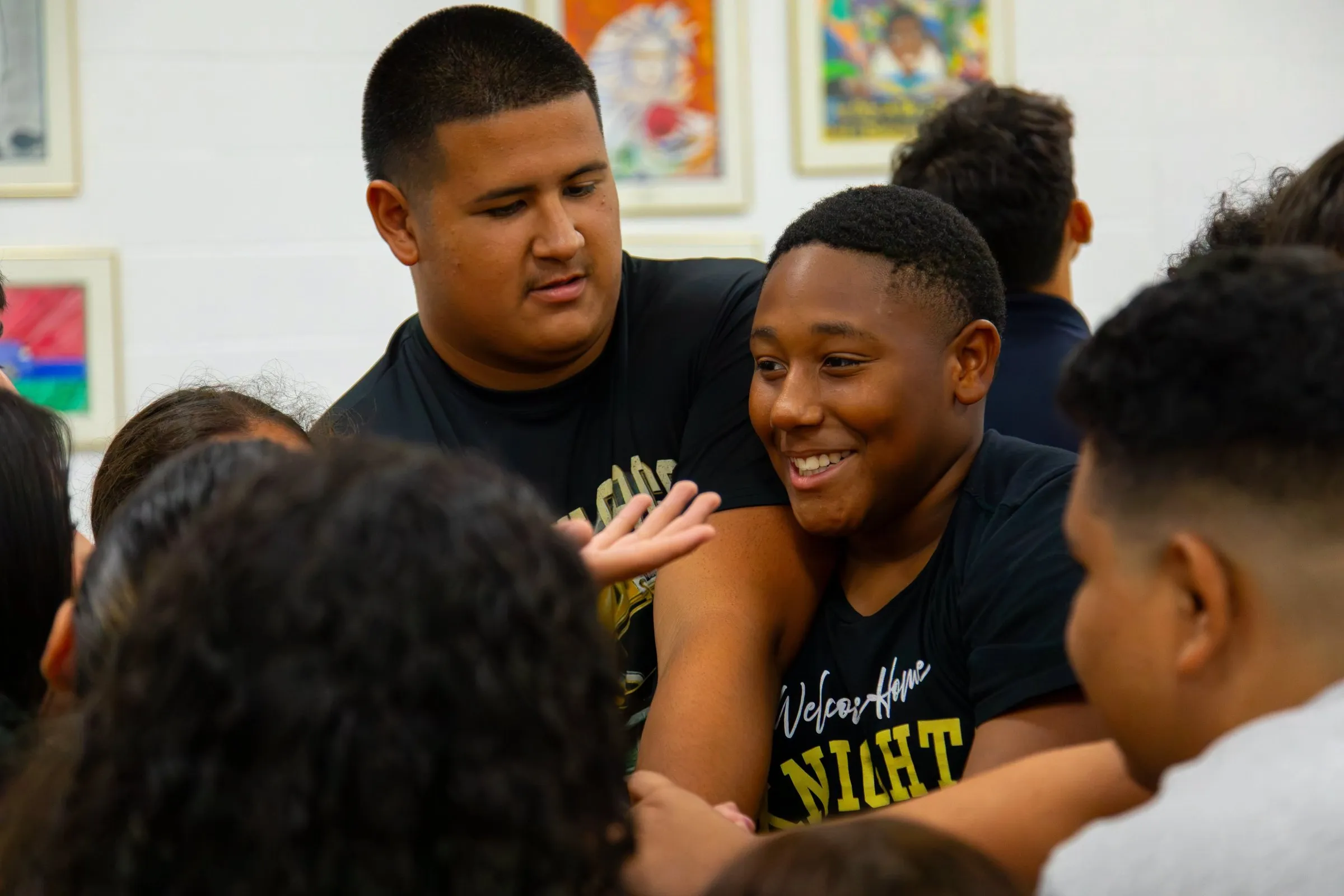 Two Holy Cross students laughing together