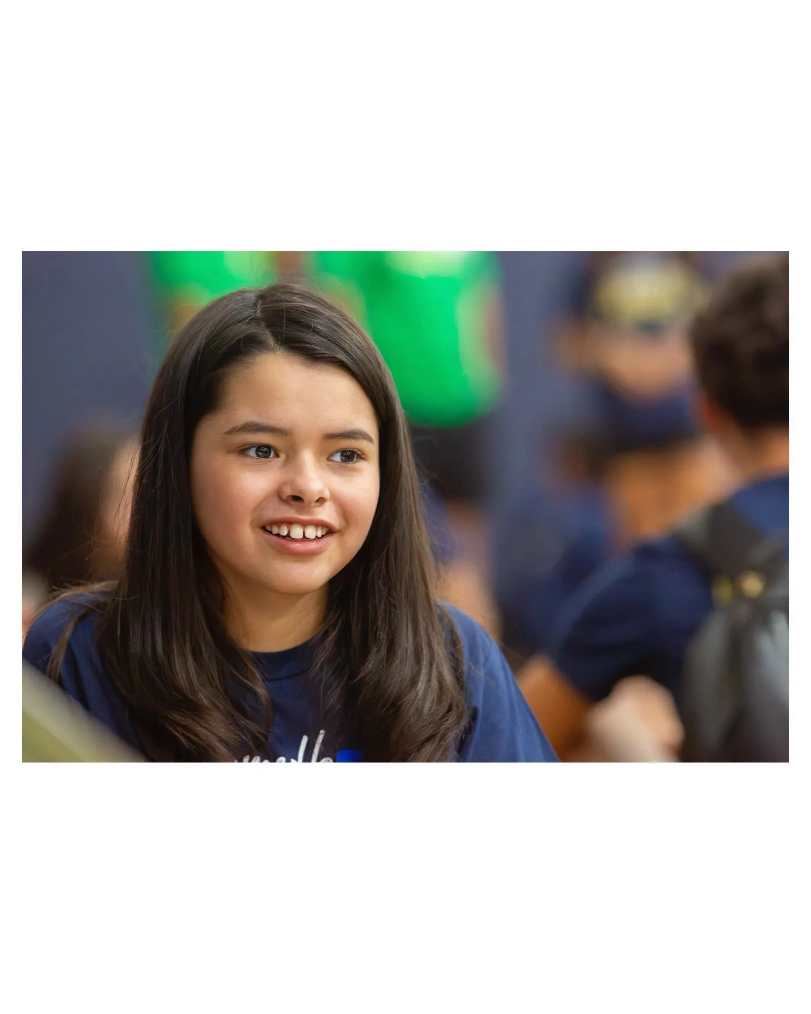 A smiling middle-school student