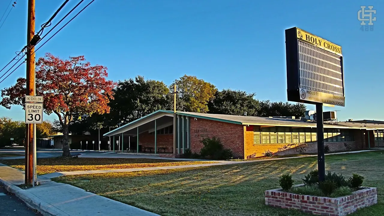 The Holy Cross campus and marquee sign at golden hour